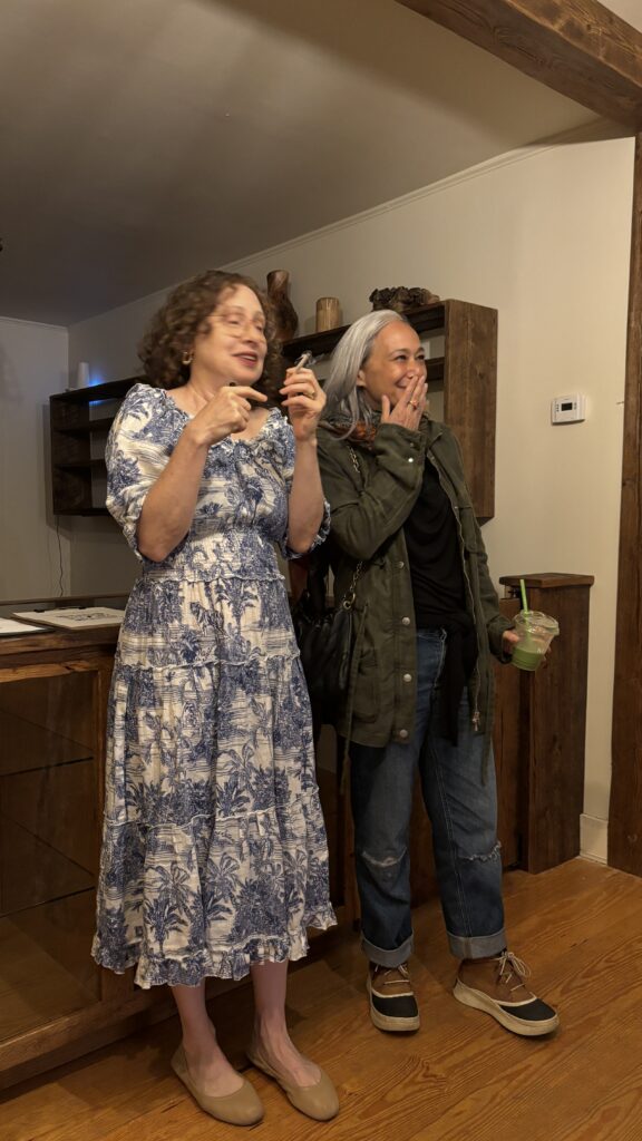 Janice Erlbaum and friend smoking a joint in a dispensary